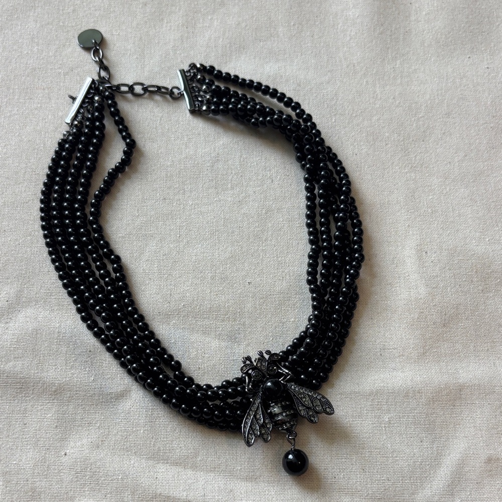 Elegant Black Beaded Necklace with Insect Pendant chocker
